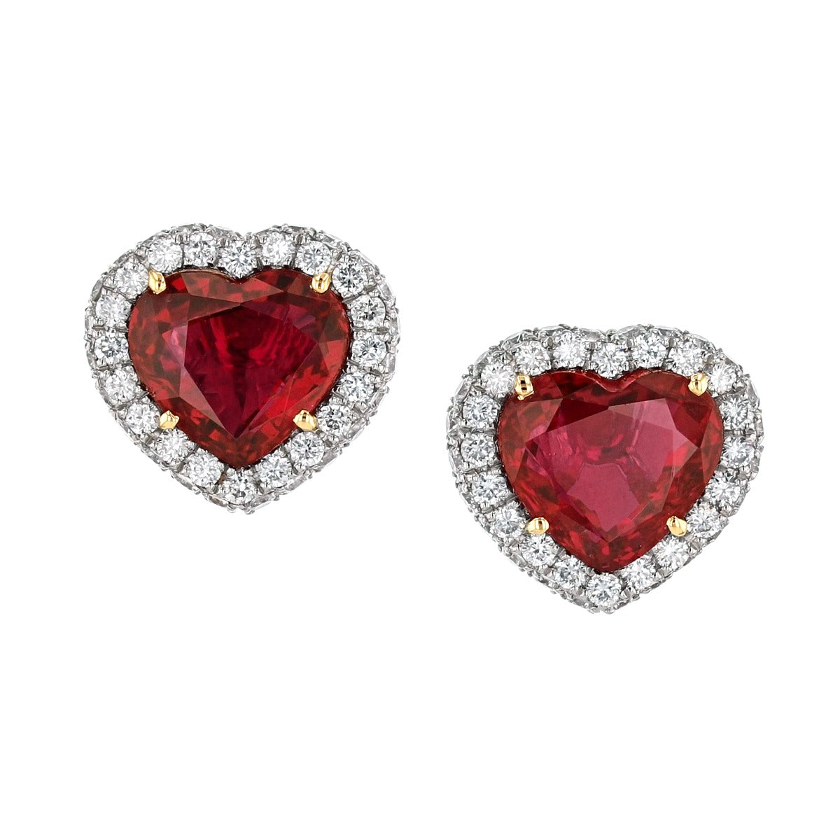 Platinum And 18Kt Earrings With 2.70Ct Heart Shaped Rubies Surrounded by 0.53ct Diamonds