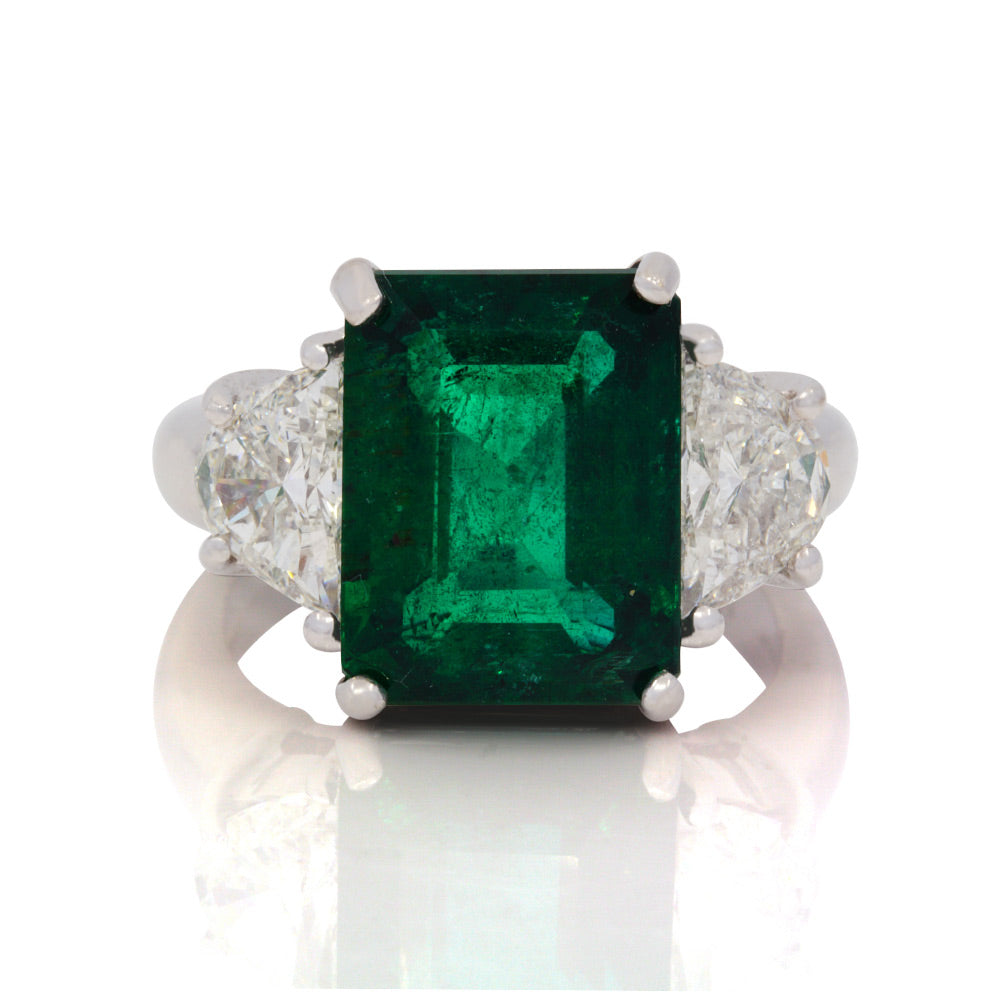 18Kt White Gold Emerald Cut Emerald And Diamond Ring